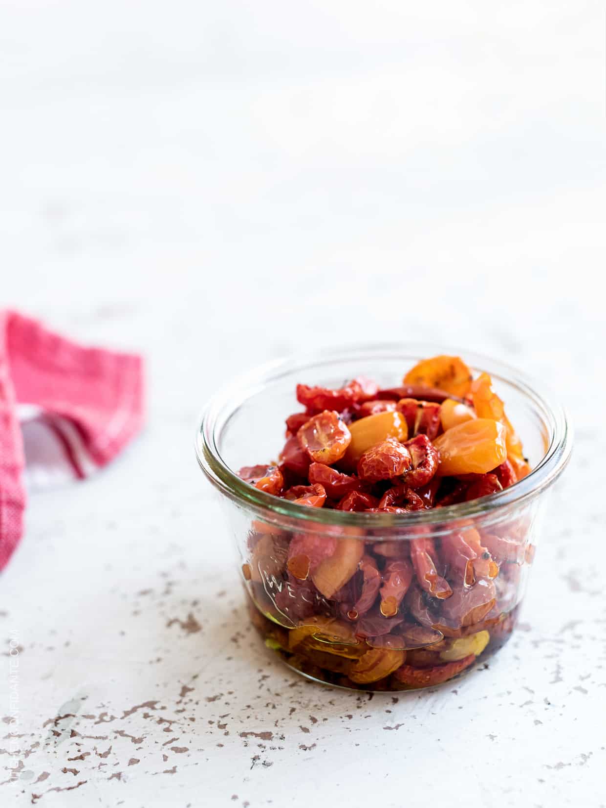 Slow roasted tomatoes for chicken pesto pizza in a jar.
