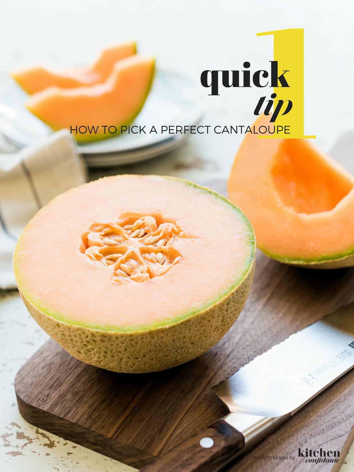 How to pick a cantaloupe - Image of a cantaloupe split in half on a wooden cutting board with slices on a stack of white plates.