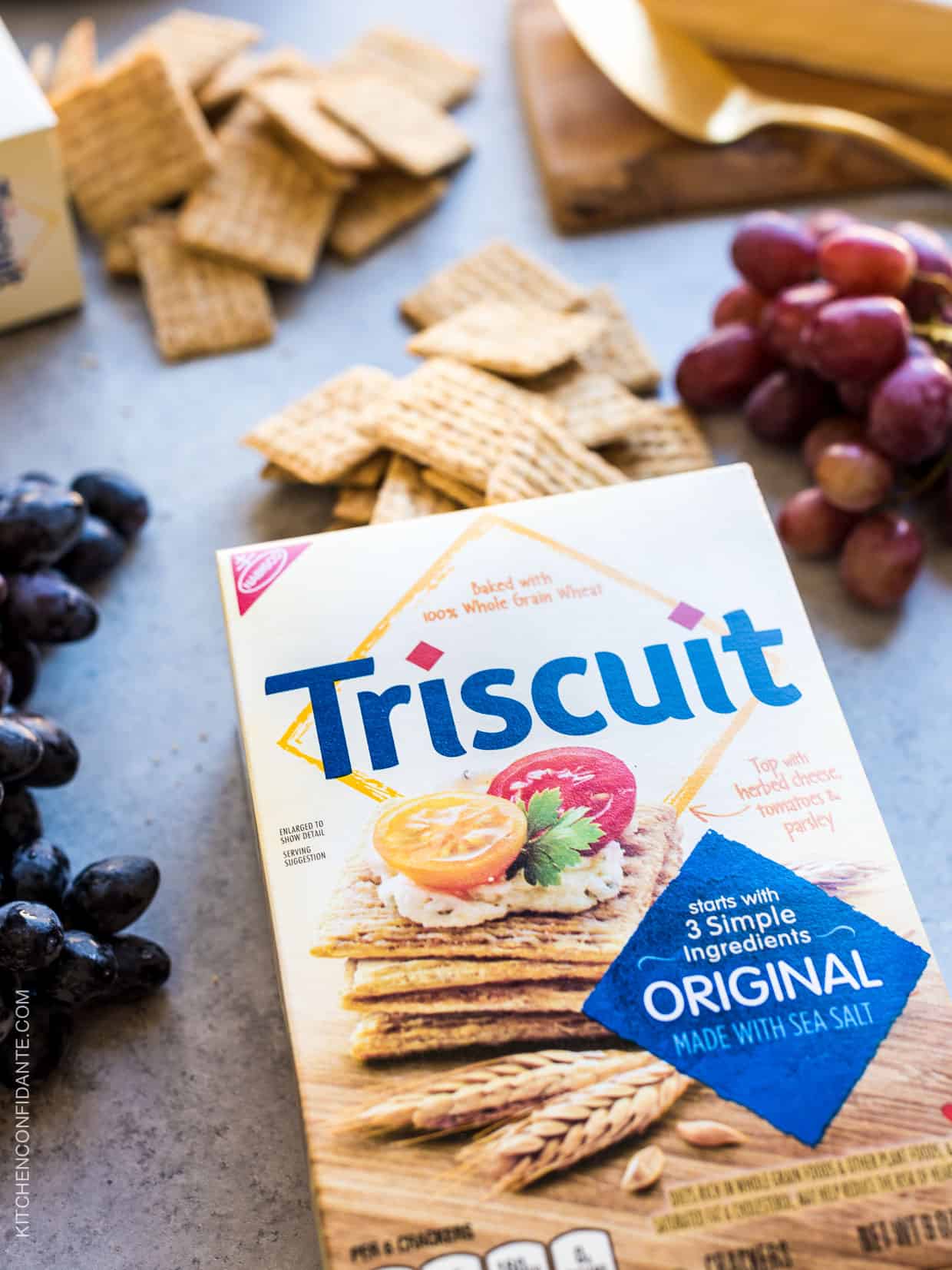 Box of Triscuit crackers spilling onto counter top.
