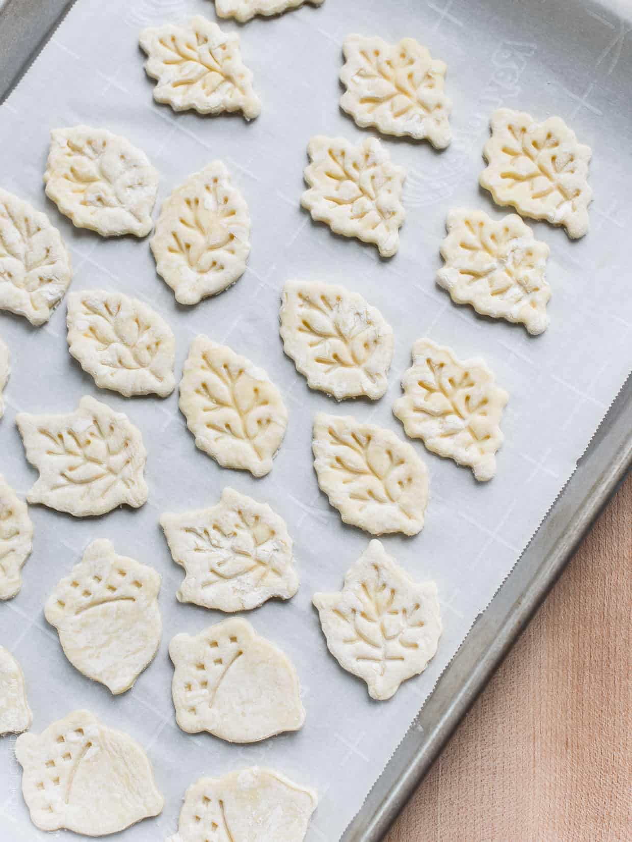 Puff pastry cut into fall leaves and acorn shapes.