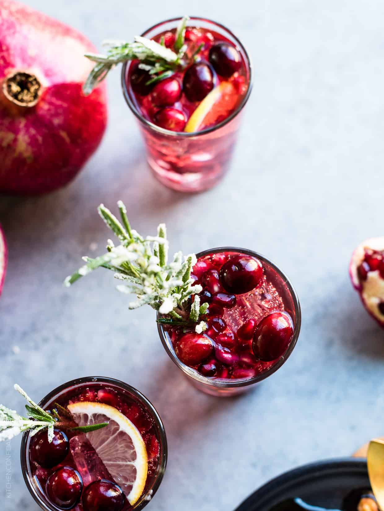 Pomegranate Rosemary Punch with sprigs of rosemary.