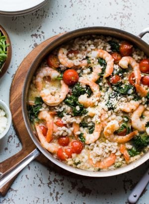 Simple, light, fresh, and made in one skillet. This delicious recipe for Greek Shrimp, Pearl Barley and Kale with Feta doesn't get any easier!
