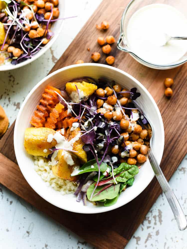 Hearty and healthy Plantain Buddha Bowl is full of nutrient rich foods that satisfy and nourish with protein and fiber rich plantains, chickpeas and greens.