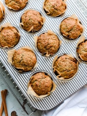 Applesauce Chia Muffins in a muffin tray.