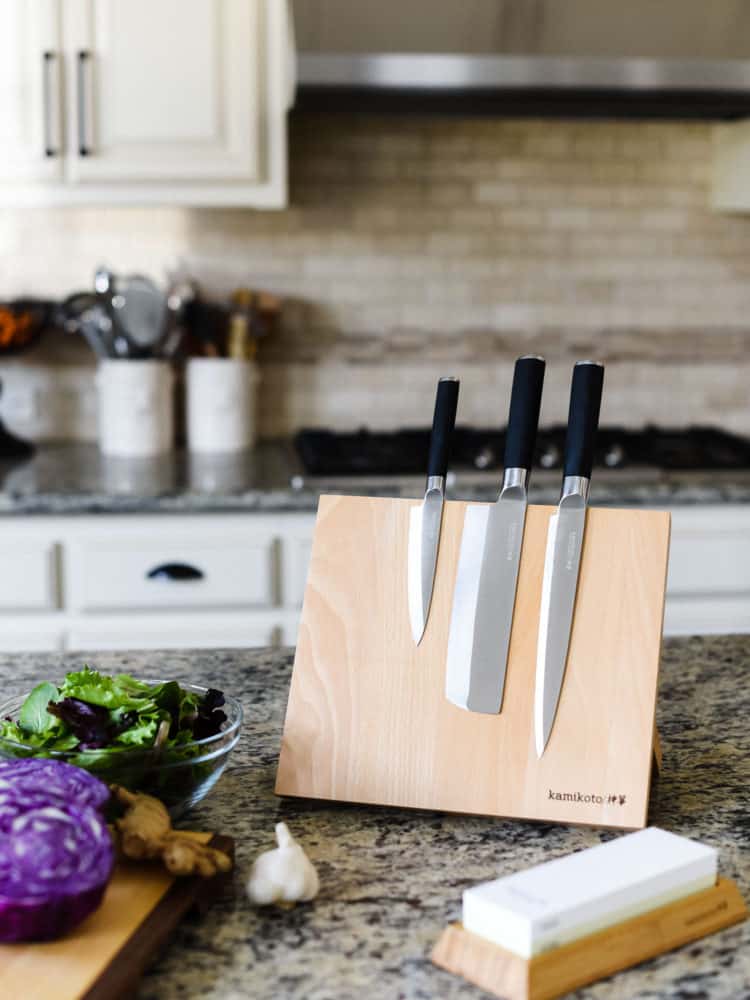 Kamikoto Knives on a knife block in a kitchen.