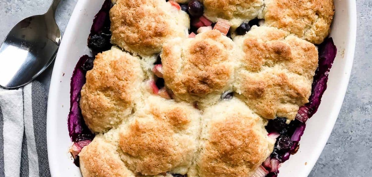 The combination of blueberry and rhubarb is nothing short of magical in the most humblest of desserts. This Blueberry Rhubarb Cobbler is the easiest recipe that you will turn to all rhubarb-season long!