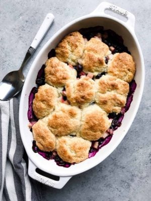 The combination of blueberry and rhubarb is nothing short of magical in the most humblest of desserts. This Blueberry Rhubarb Cobbler is the easiest recipe that you will turn to all rhubarb-season long!