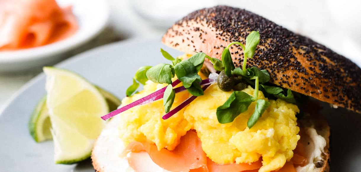 This recipe for Scottish Smoked Salmon Bagel with Scrambled Eggs gives bagel with lox a luxurious update with silky, English-style scrambled eggs.