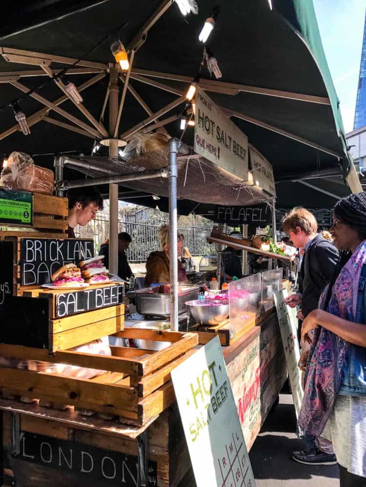 Hot food vendor market stall at Borough Market in London.