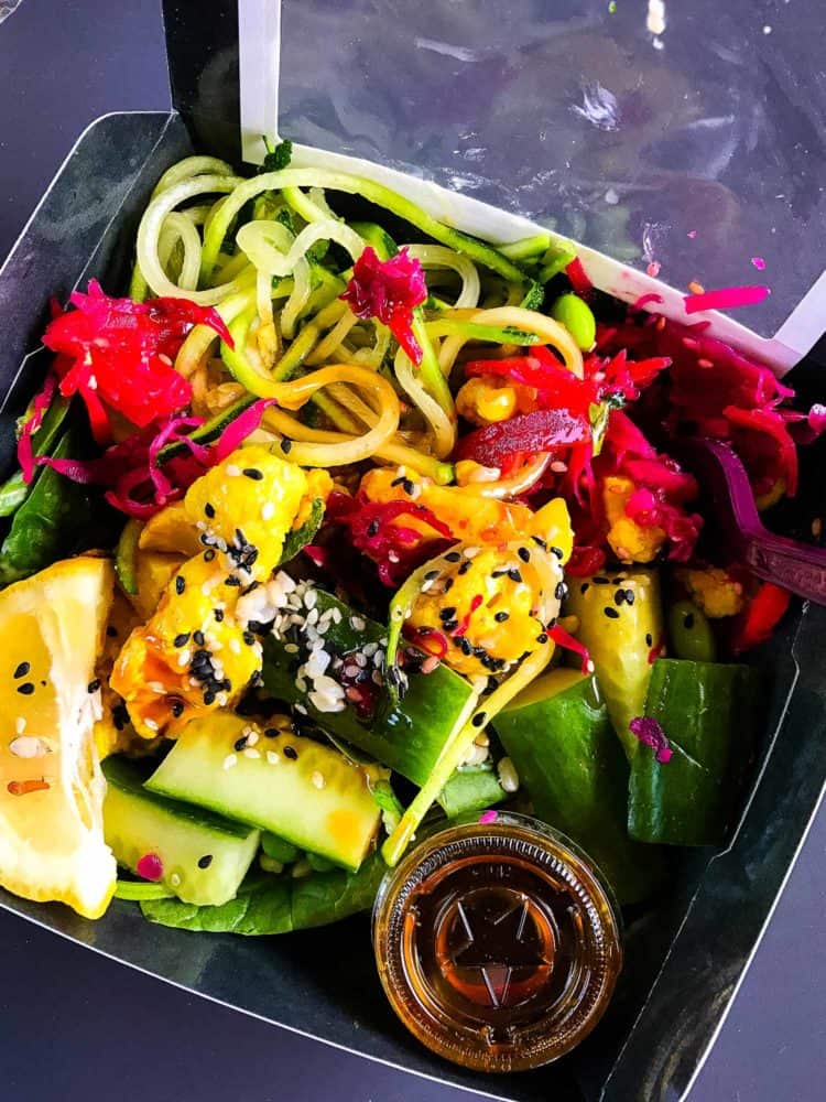 Zucchini, beets, cucumber, and sesame seeds in a salad at Pret in London.