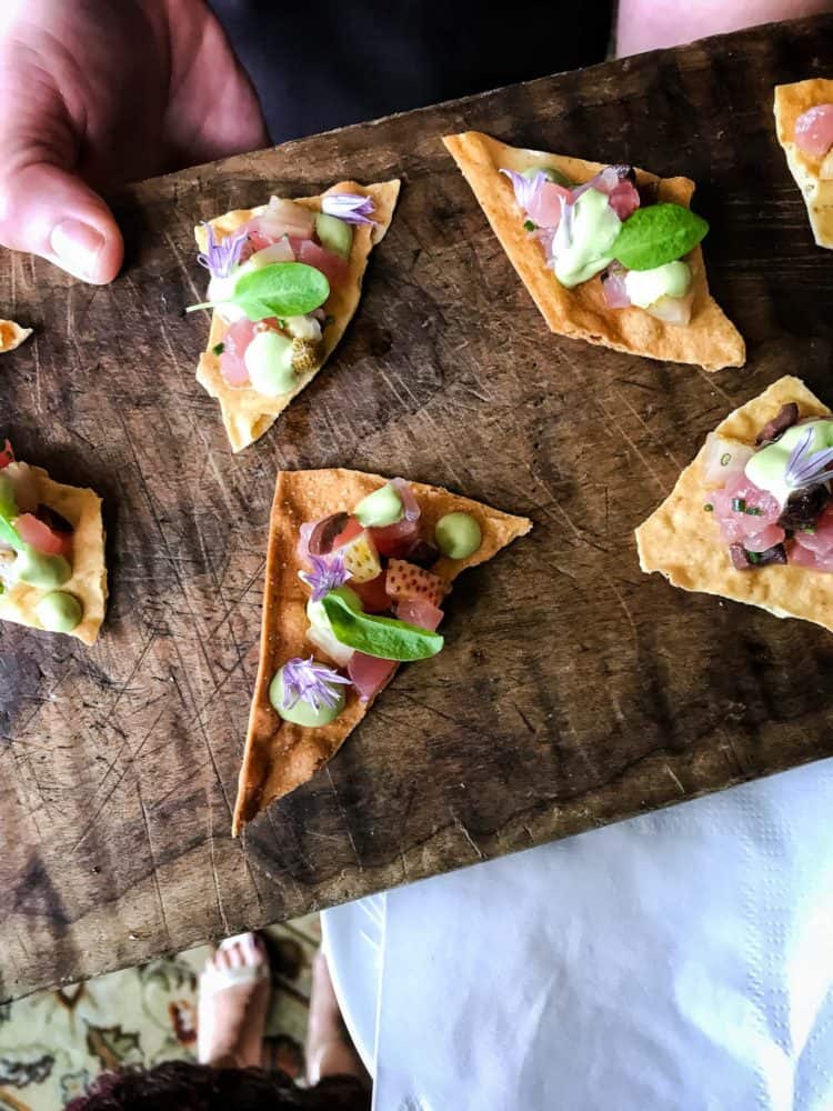 Tuna Tartare on wonton crisps served on a wooden board at the Pebble Beach Food & Wine.