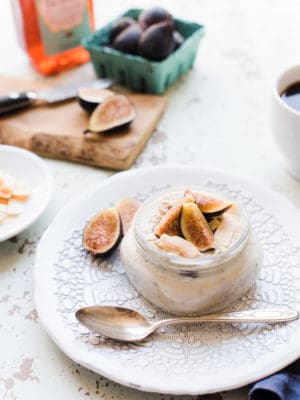 Overnight Oats in mason jar topped with figs and coconut.