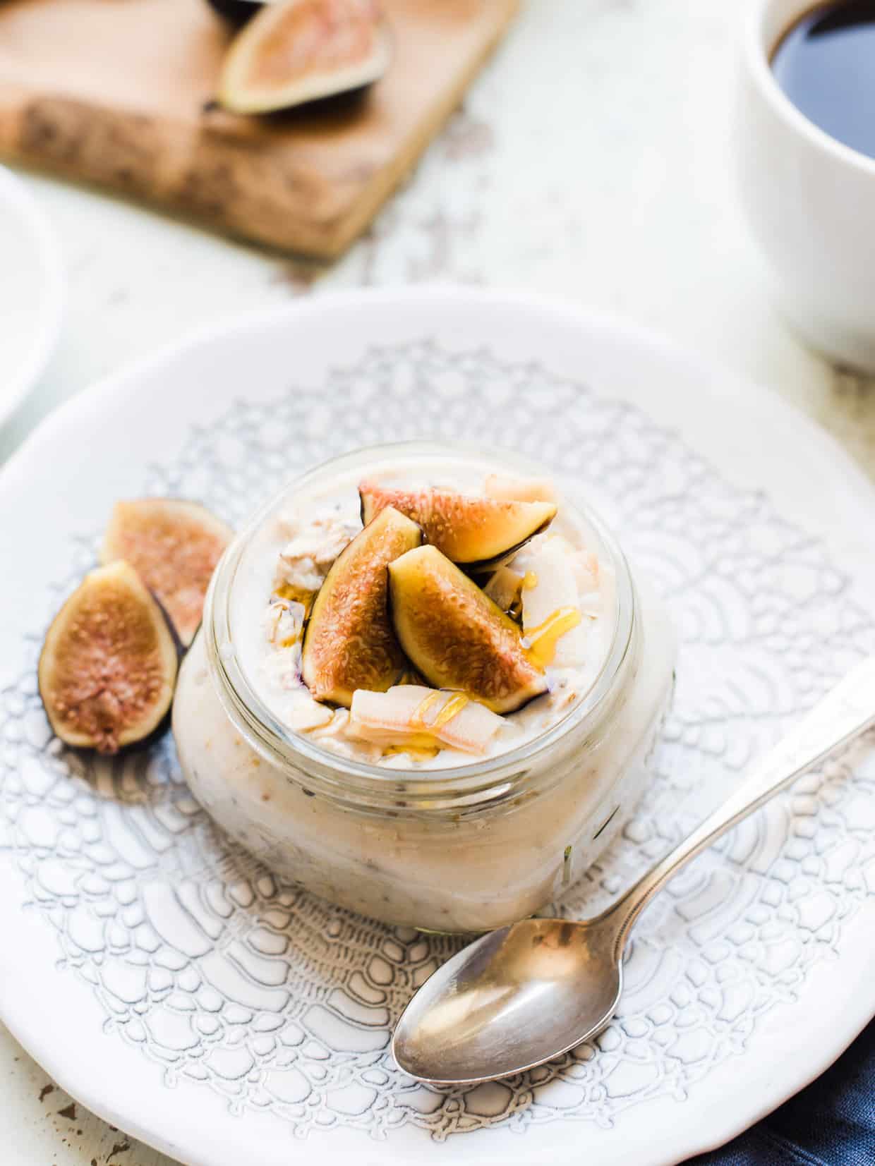 Overnight Oats in mason jar topped with figs and coconut.