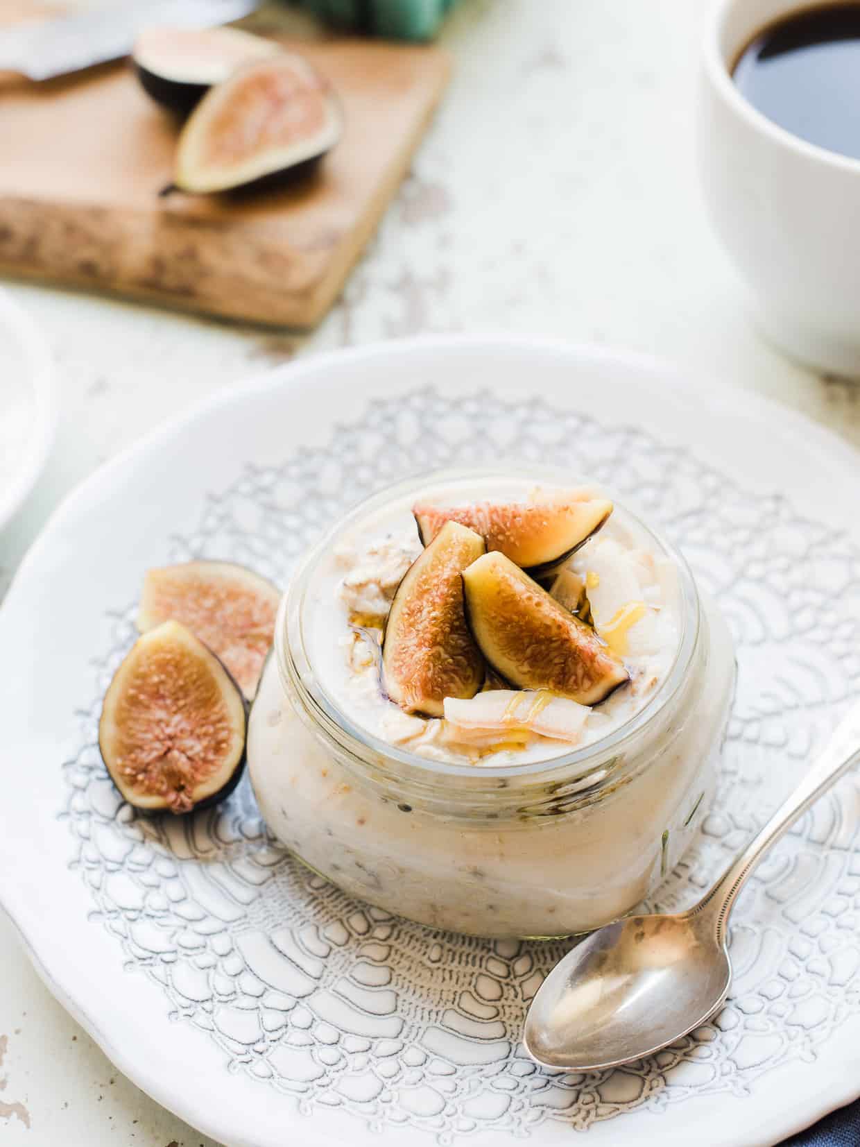 Overnight Oats in mason jar topped with figs and coconut.