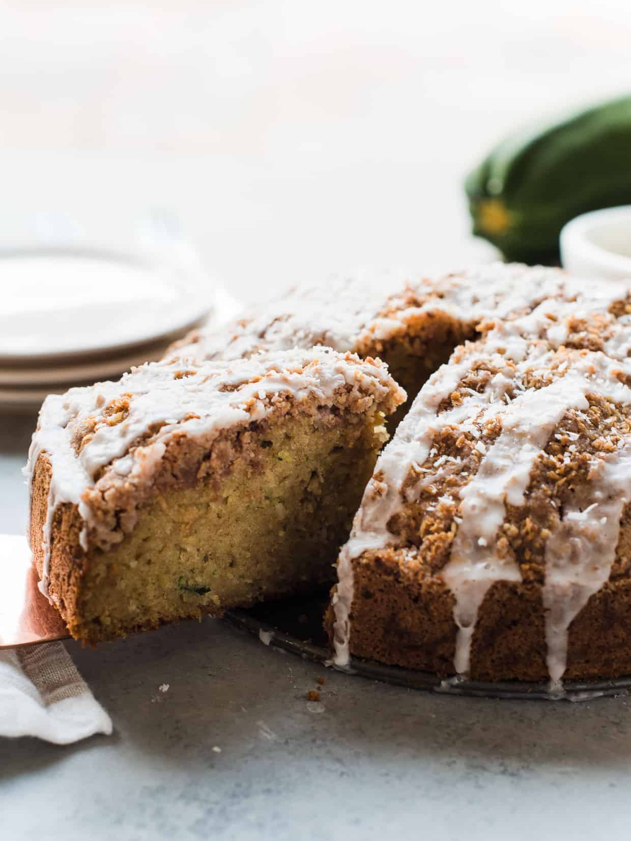 Slicing into coconut zucchini coffee cake.