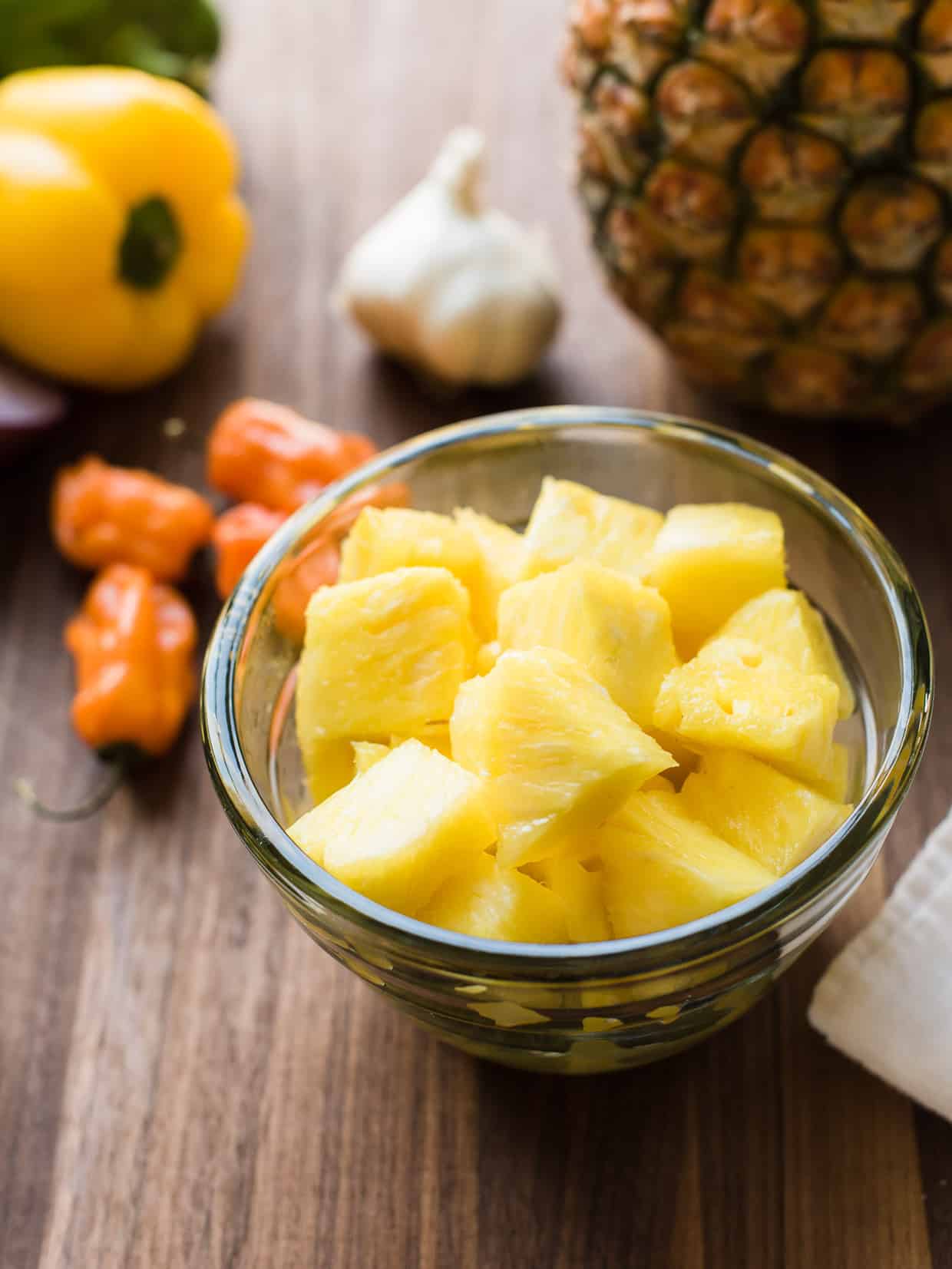 A bowl of cut pineapple to make Grilled Tempeh and Vegetable Skewers.
