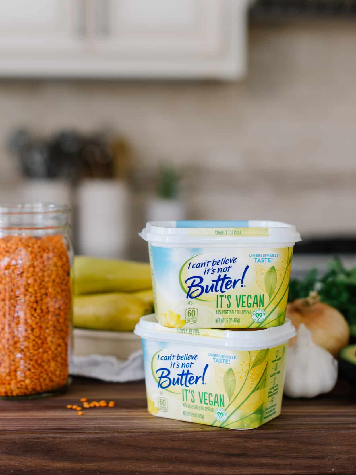 Containers of I Can't Believe It's Not Butter! It's Vegan and a jar of red lentils to make Lentil Stuffed Summer Squash.