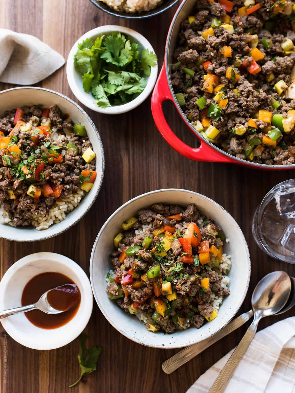 Dining table filled with bowls of homemade Filipino-style Picadillo.