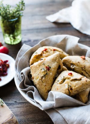 Sun-dried Tomato and Thyme Scones in a bowl with a cloth napkin.