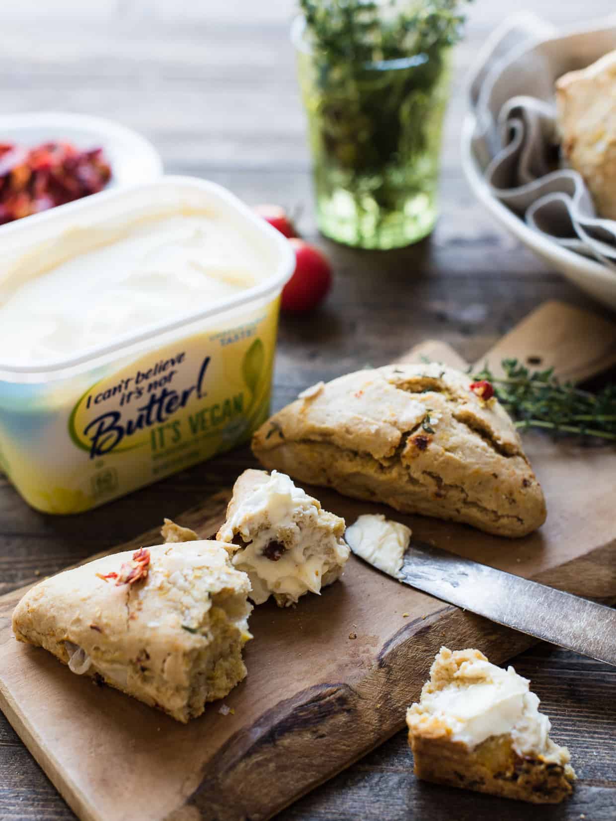 Vegan scones topped with I Can't Believe It's Not Butter! It's Vegan.