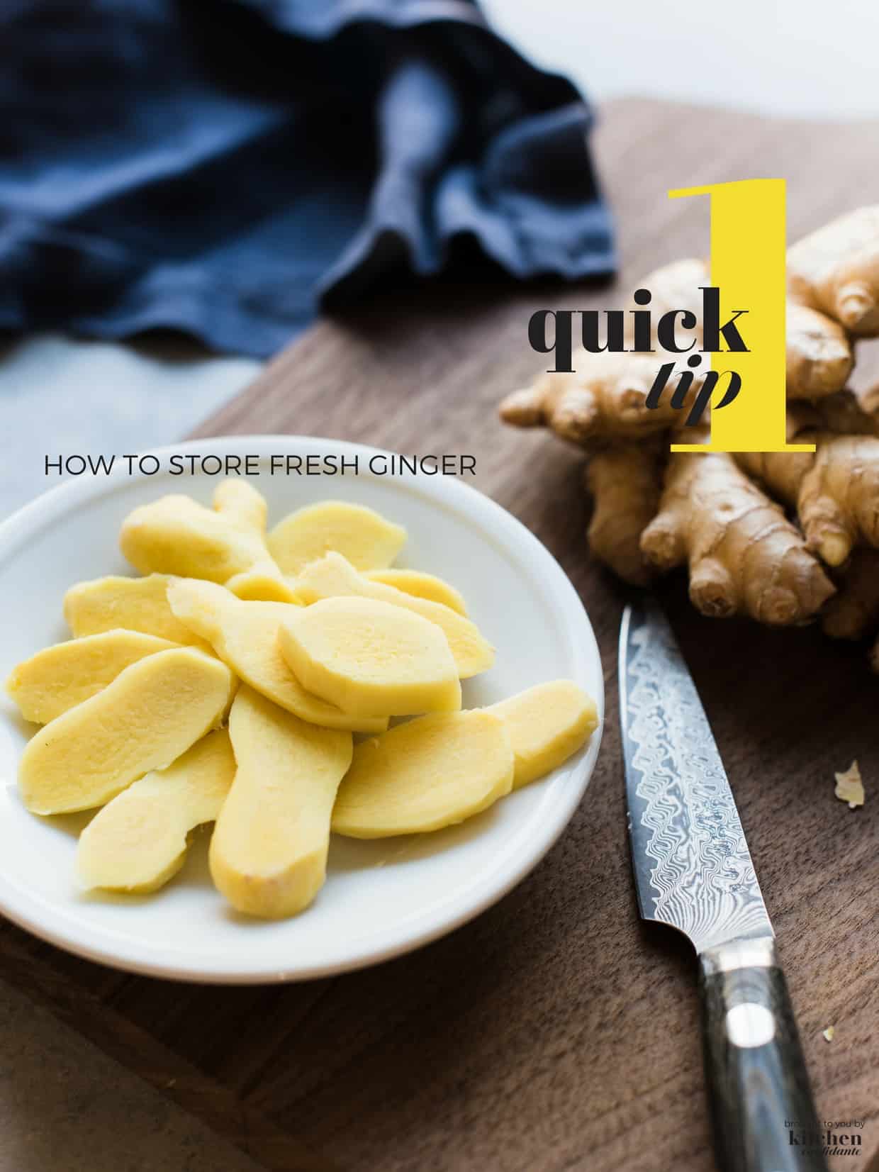 Sliced fresh ginger root on a wooden cutting board.