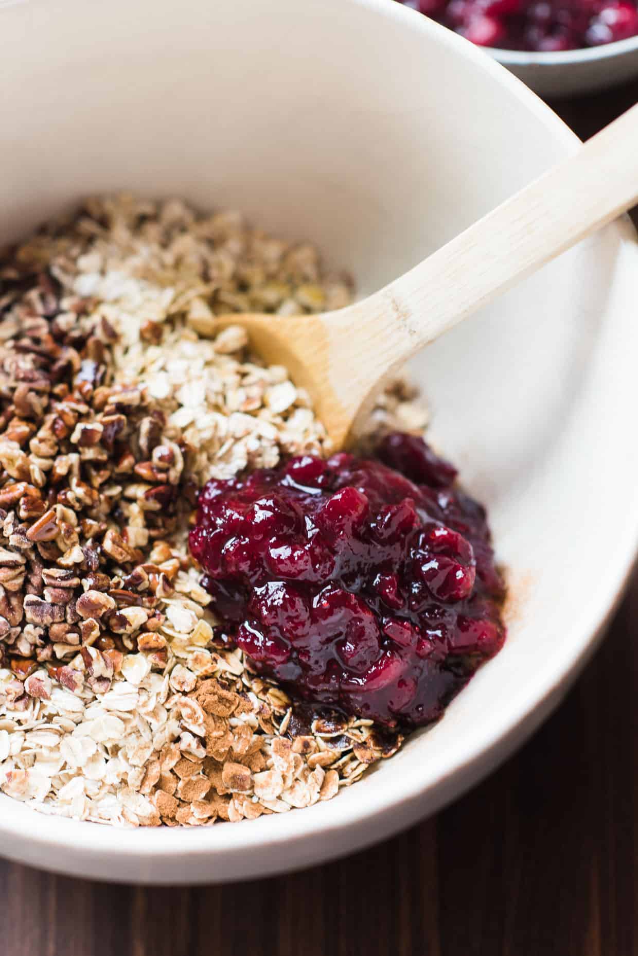 Mix of ingredients to make Cranberry Sauce Granola with cranberry sauce leftovers.