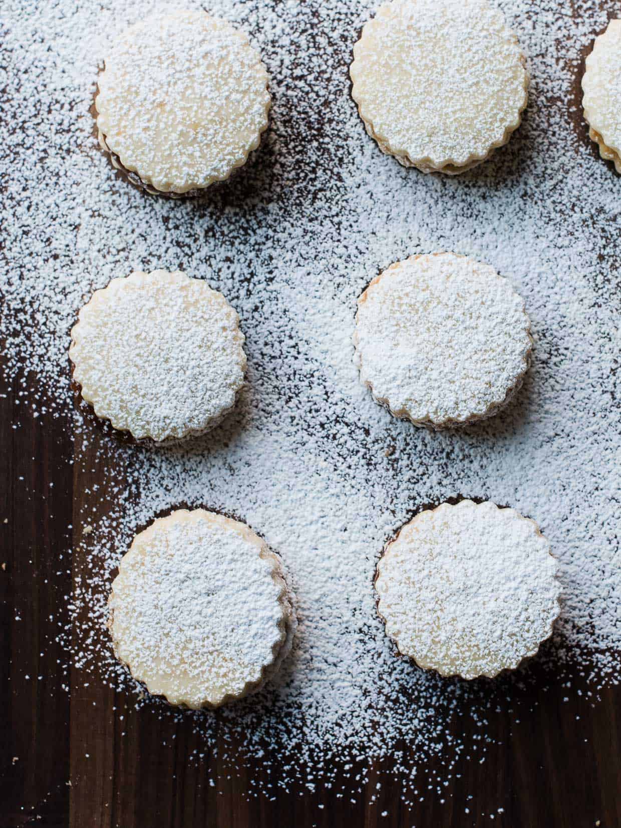 Alfajores (a sandwich cookie made with tender shortbread) sprinkled with powdered sugar.