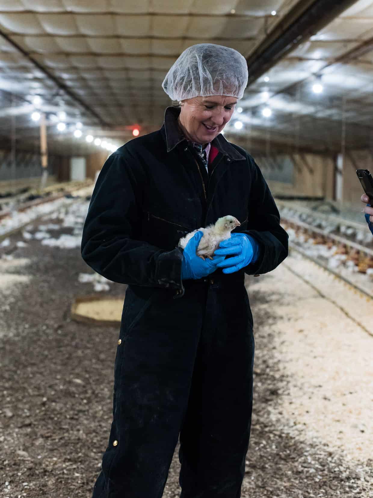 Jenny Rhodes and the chickens she raises. #sponsored National Chicken Council