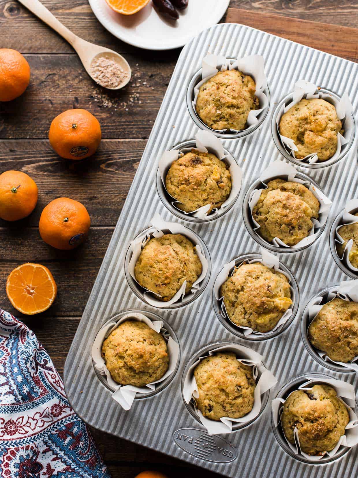 Overhead shot of mandarin orange ginger date muffins made with Wonderful Halos.