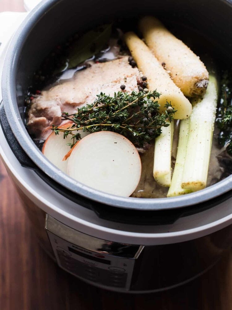 Save time and boost flavor and make soup stock in a pressure cooker! This method for pressure cooker soup stock works for homemade chicken, turkey, beef and ham stock! Make homemade soup stock in about 30 minutes!