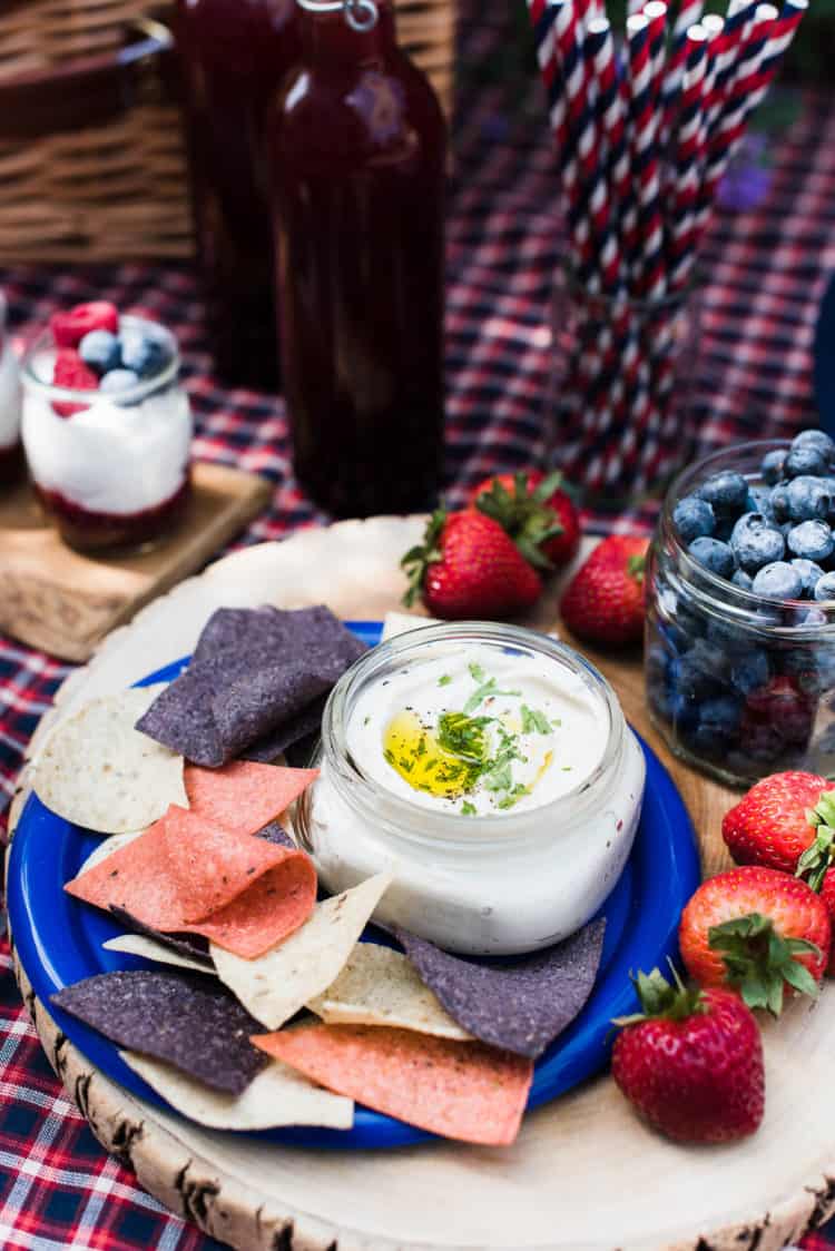 Red white and blue picnic ideas, with chips, dip, berries dessert