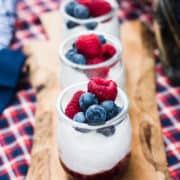 Mixed Berry Fruit-on-the-Bottom Yogurt Cups on a cutting board.