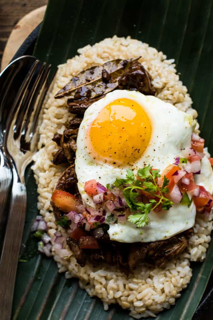 Shredded chicken adobo loco moco with egg and rice.