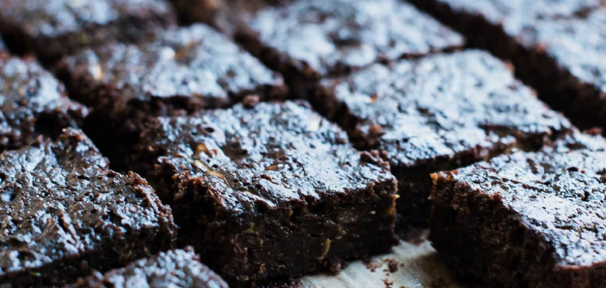 Zucchini Banana Brownies on cutting board.