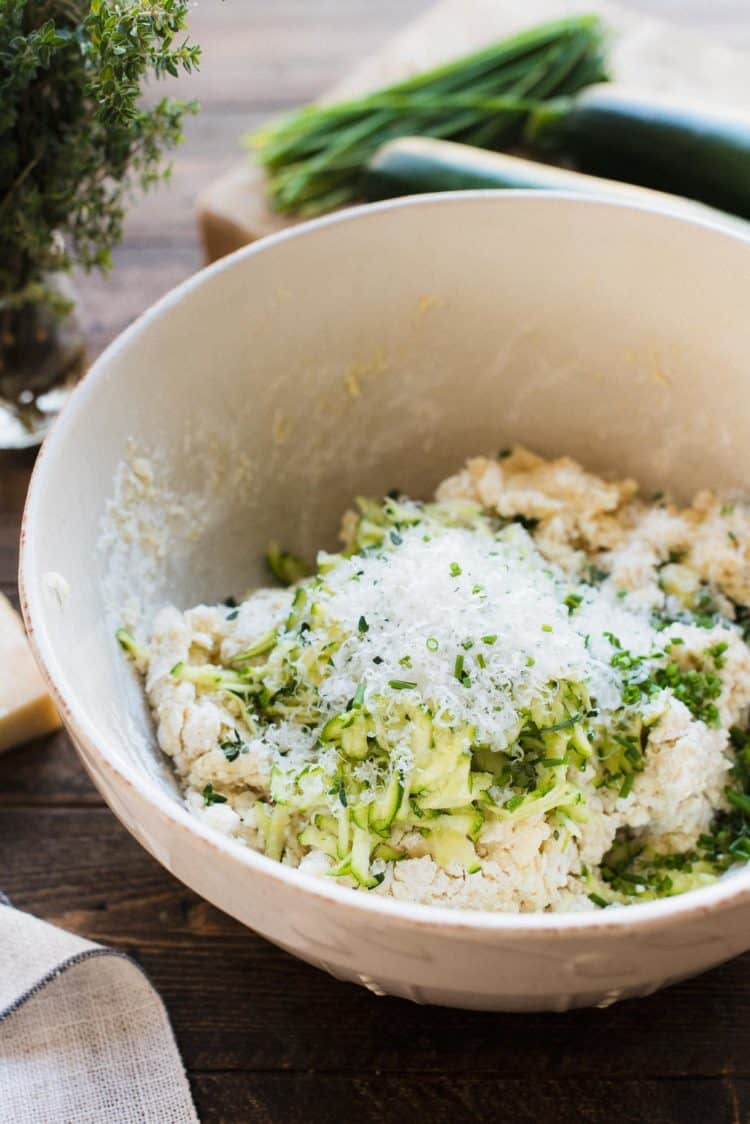 Ingredients for Savory Zucchini Scones with Feta and Thyme in a bowl.