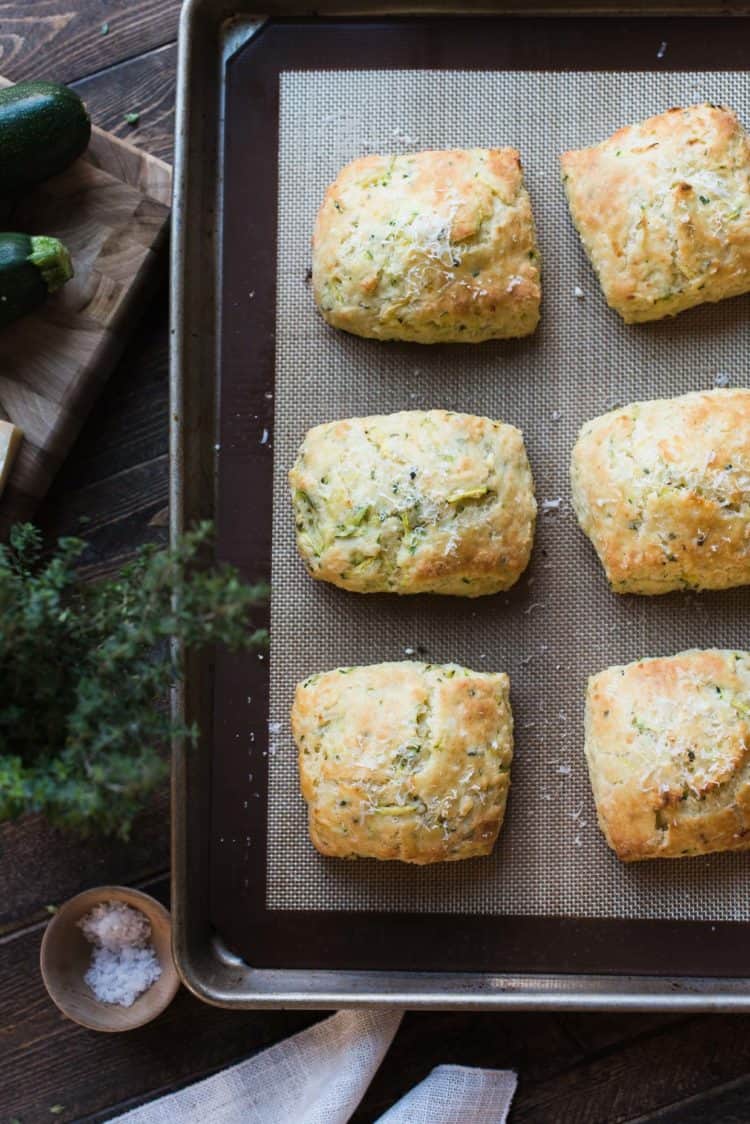 Baking sheet with freshly baked Savory Scones with Zucchini, Feta and Thyme.