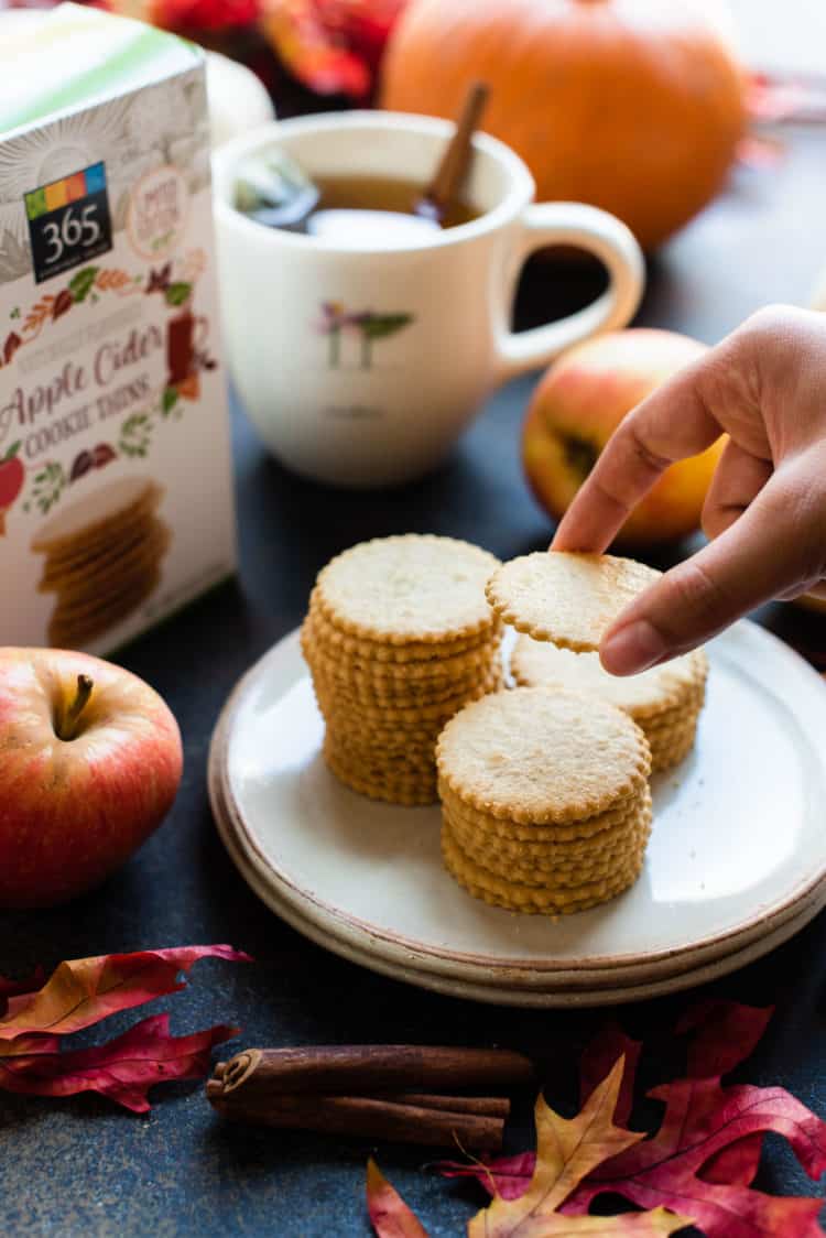 Reaching for a stack of apple cider cookie thins.