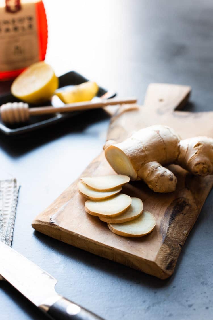 Slices of fresh ginger for Homemade Fresh Ginger Tea.