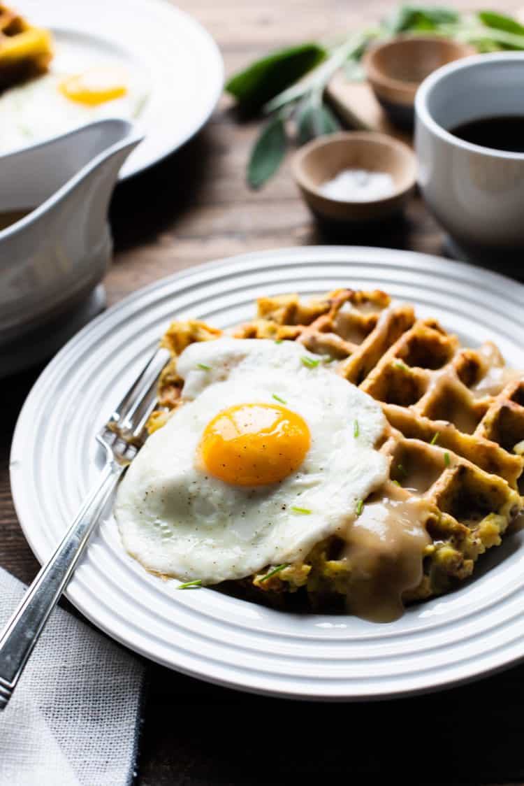 Mashed Potato and Stuffing Waffles served with eggs and gravy.