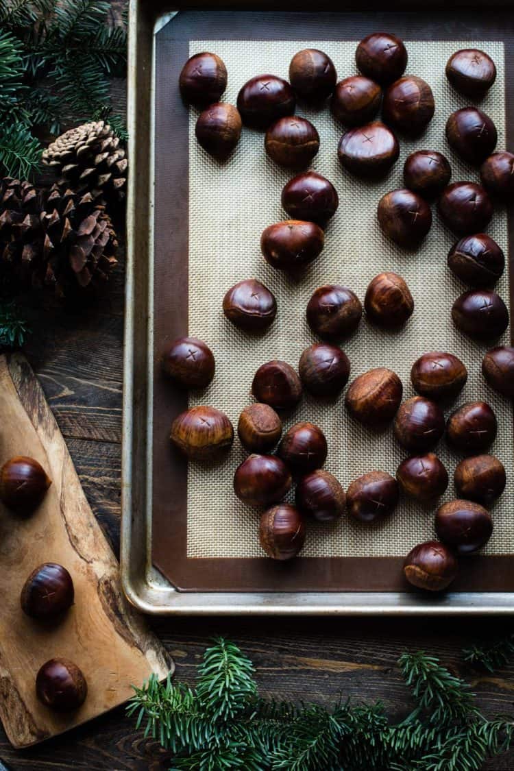 Oven Roasted Chestnuts on a baking sheet.