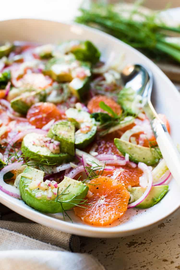 Citrus and Avocado Salad with Quick-Pickled Fennel in a white oval platter.