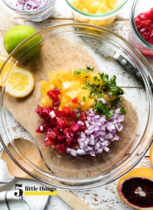 Ingredients for citrus salsa in a bowl.