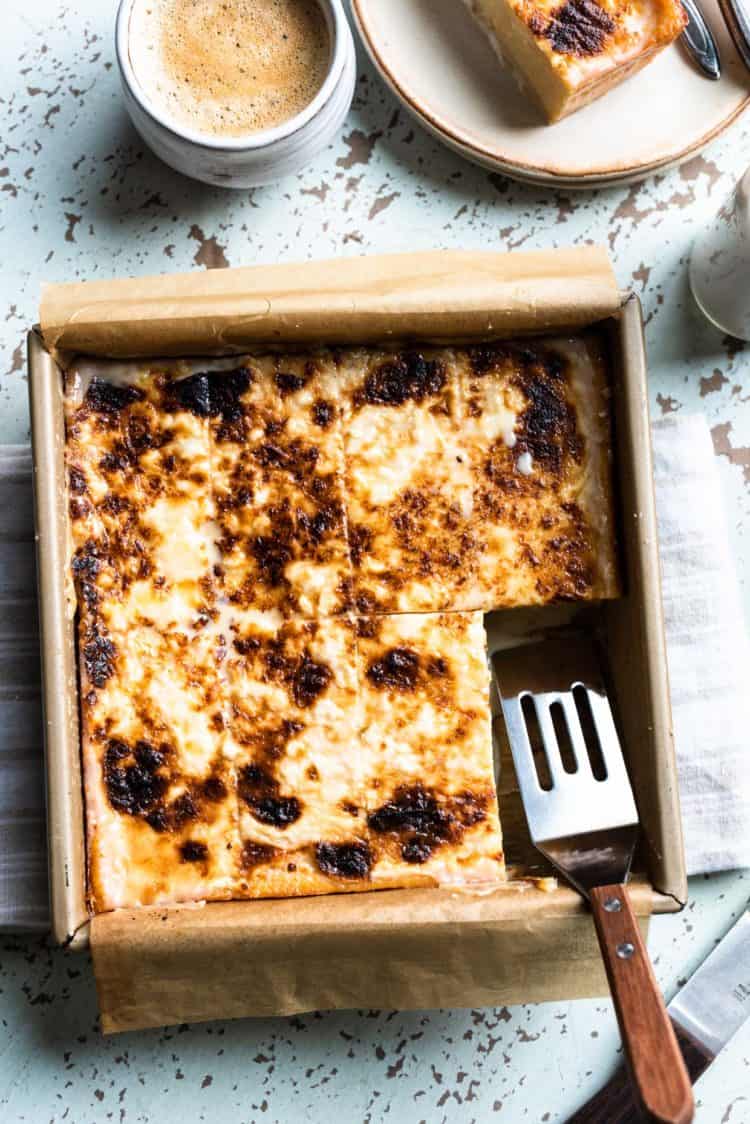 Cassava Cake in a square cake pan.