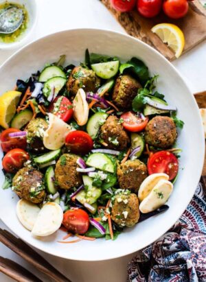 Falafel Salad with Lemon Garlic Dressing in a white bowl.