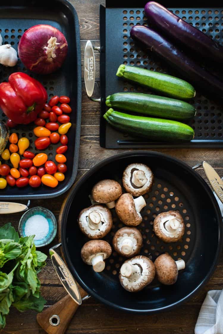 Summer vegetables on All-Clad Outdoor Nonstick Grill Pans for a grilled vegetable pizza recipe.