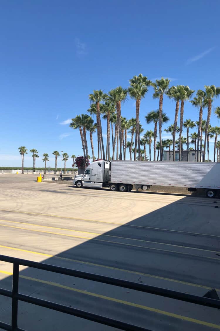 Trucks get ready to ship produce from Stamoules Produce in Central Valley California.