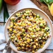 Summer Corn and Nectarine Tabbouleh in a cream colored serving dish.