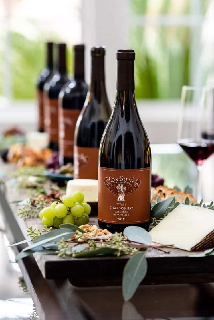 A flight of Clos du Val wines and cheese board for how to host a wine tasting party.