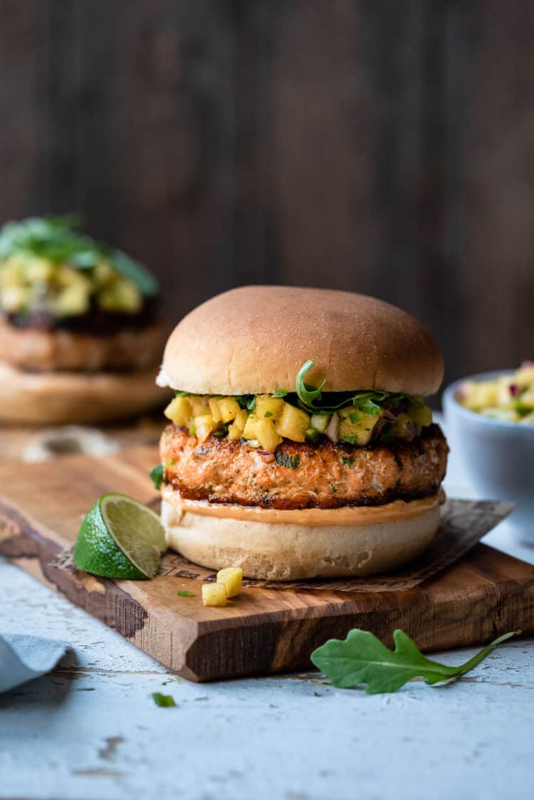 Thai Salmon Burger topped with pineapple salsa.