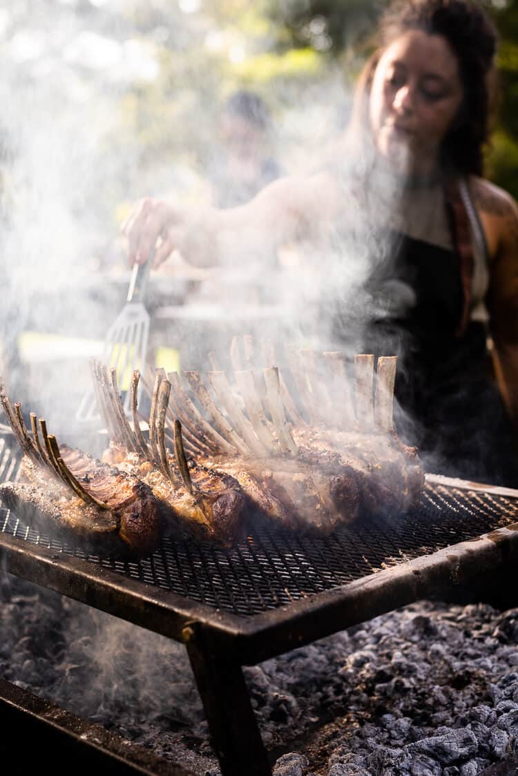 Cooking lamb on a grill.